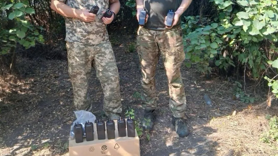 10 Motorola radios with spare batteries